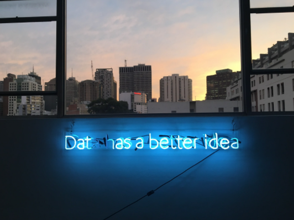 a neon sign saying data has a better idea