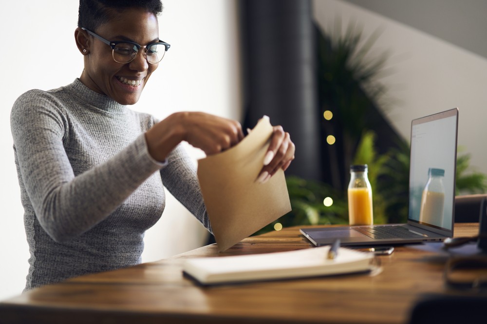 woman opening an envelope