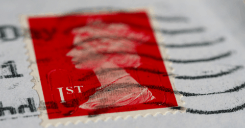 Red postage stamp of Queen Elizabeth