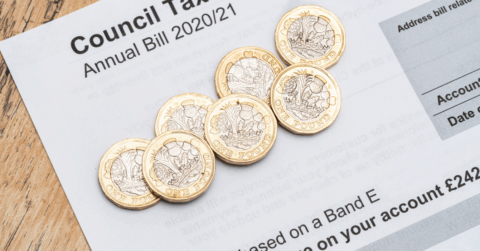 Council tax government mail with pound coins on top
